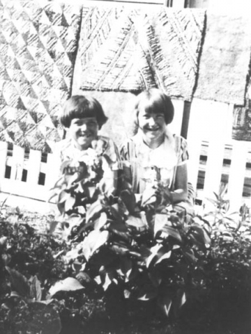 206: l-r Madonna Rose and Reen McCarthy, with floormats hanging on McCarthy's fence. (circa 1936)  - Madonna daughter of William Rose &amp;amp; Emma Withers; Reen daughter of James McCarthy &amp;amp;  Julia Reddy